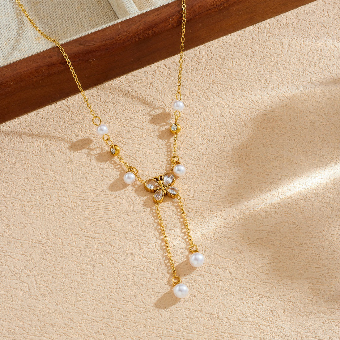 Elegant Butterfly Rhinestone and Imitation Pearl Tassel Pendant Necklace Stainless Steel for Women