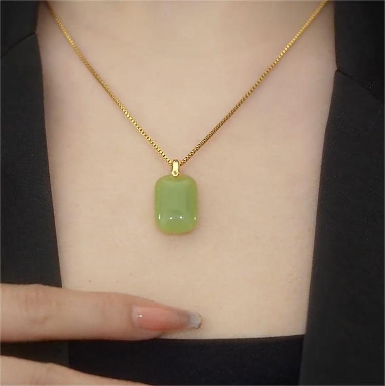 Collana da donna con ciondolo in acciaio al titanio dalla forma irregolare, design originale, con intarsio in lega di rame e finitura placcata