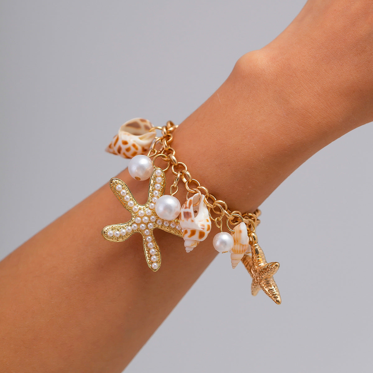 Collana con ciondolo a stella e conchiglia in stile vacanza con dettaglio nappa in lega con finitura placcata per donne e uomini
