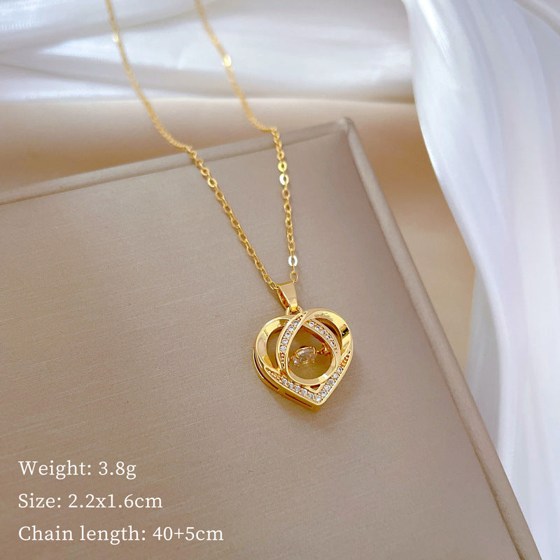 Collana di Lusso da Donna in Acciaio al Titanio con Ciondolo a Cuore di Zirconi e Delicata Catena a Clavicola, Design Geometrico