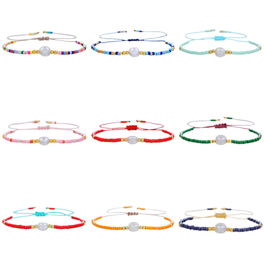 Bracciale bohémien regolabile da donna con perle, perline e perline di riso, dal design geometrico