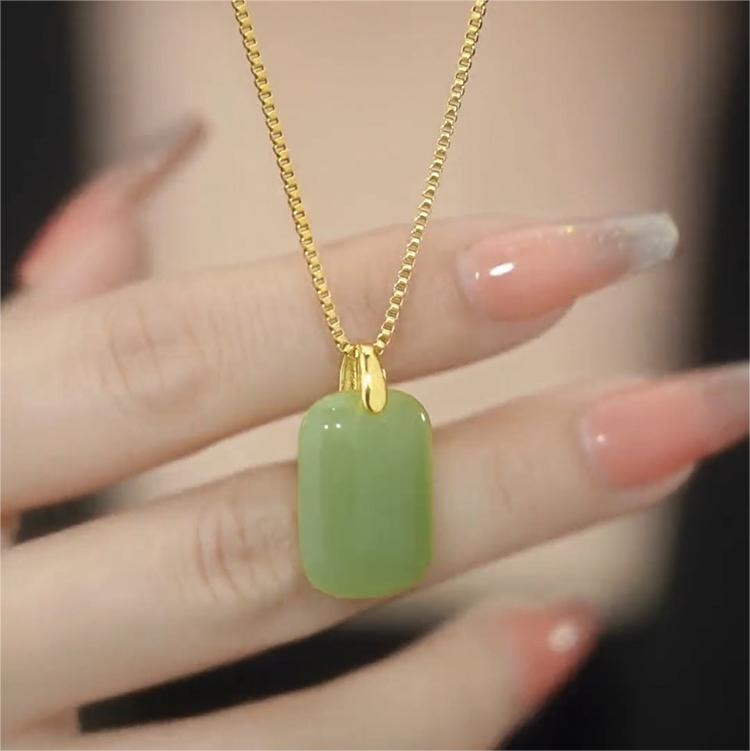 Collana da donna con ciondolo in acciaio al titanio dalla forma irregolare, design originale, con intarsio in lega di rame e finitura placcata