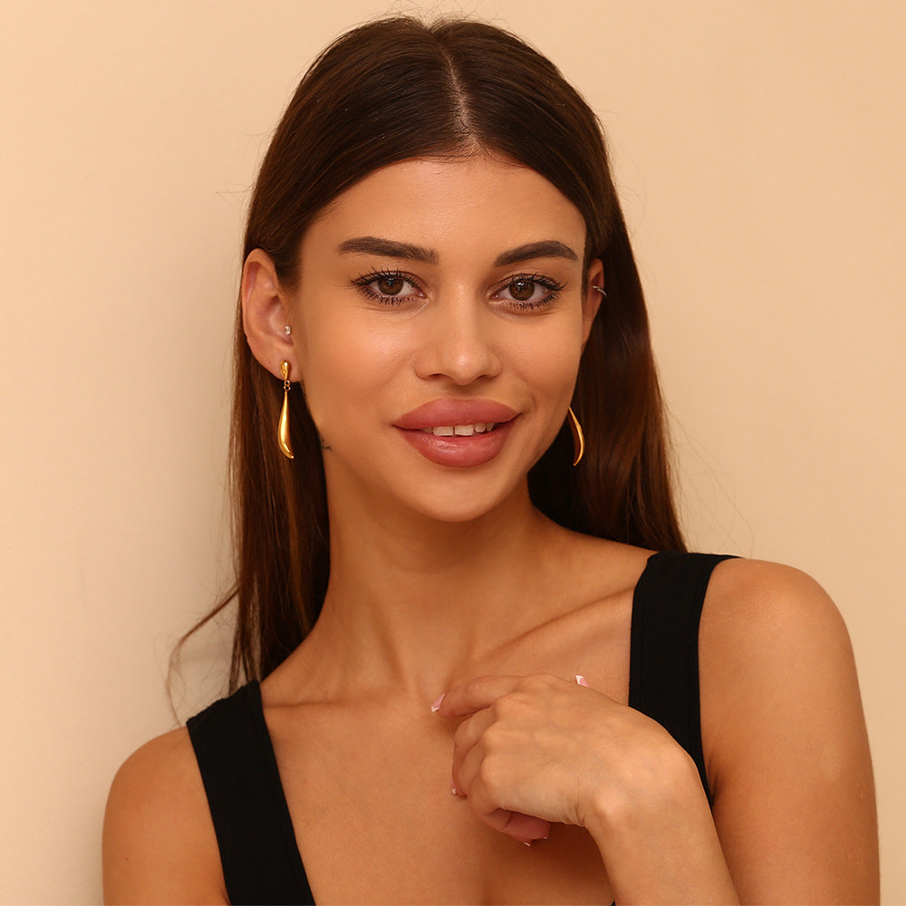 Geometric Irregular Fashion Earrings in Stainless Steel with 18K Gold Plating Featuring Spiral Seashell Design and Simulated Pearl Accents