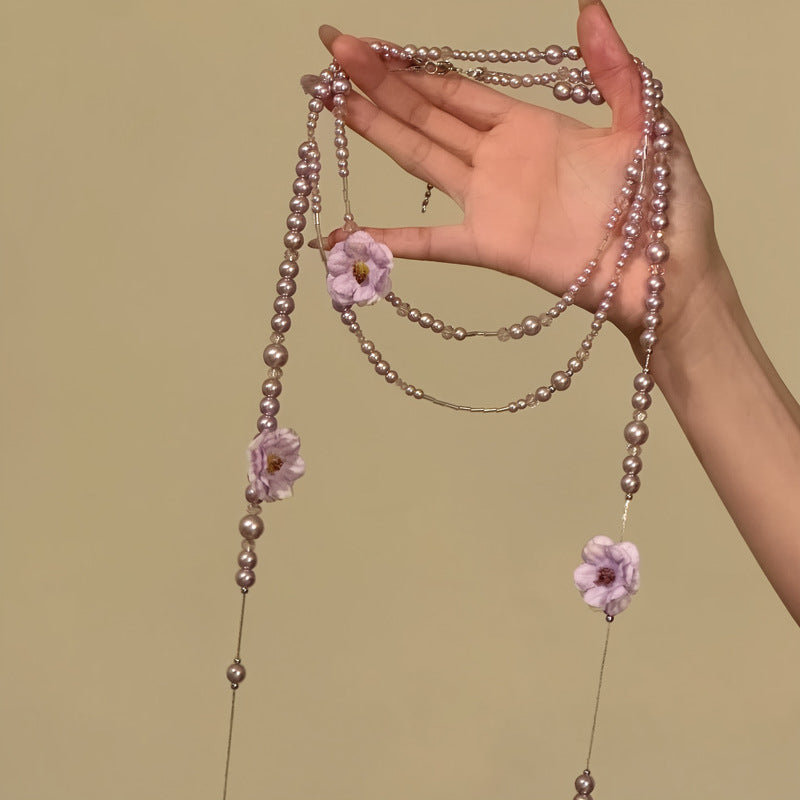 Elegante collana floreale di perle da donna con finitura galvanica, catena maglione in dolce stile vintage, gioielli con ciondolo di lusso leggero