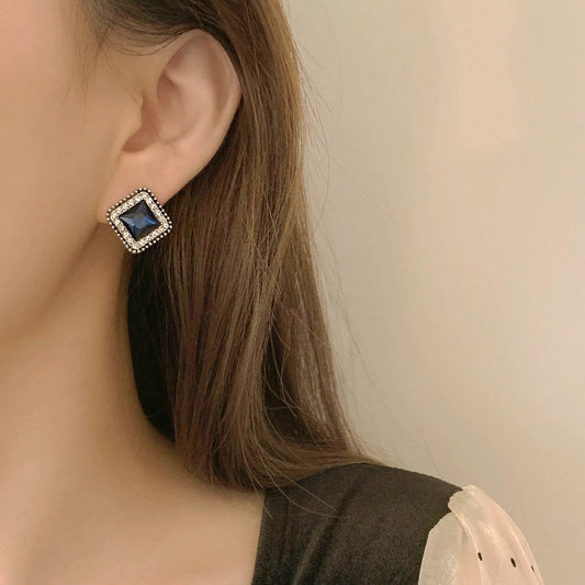 Orecchini a perno geometrici minimalisti a rombo da donna in lega con intarsio in cristallo blu e perni in acciaio inossidabile