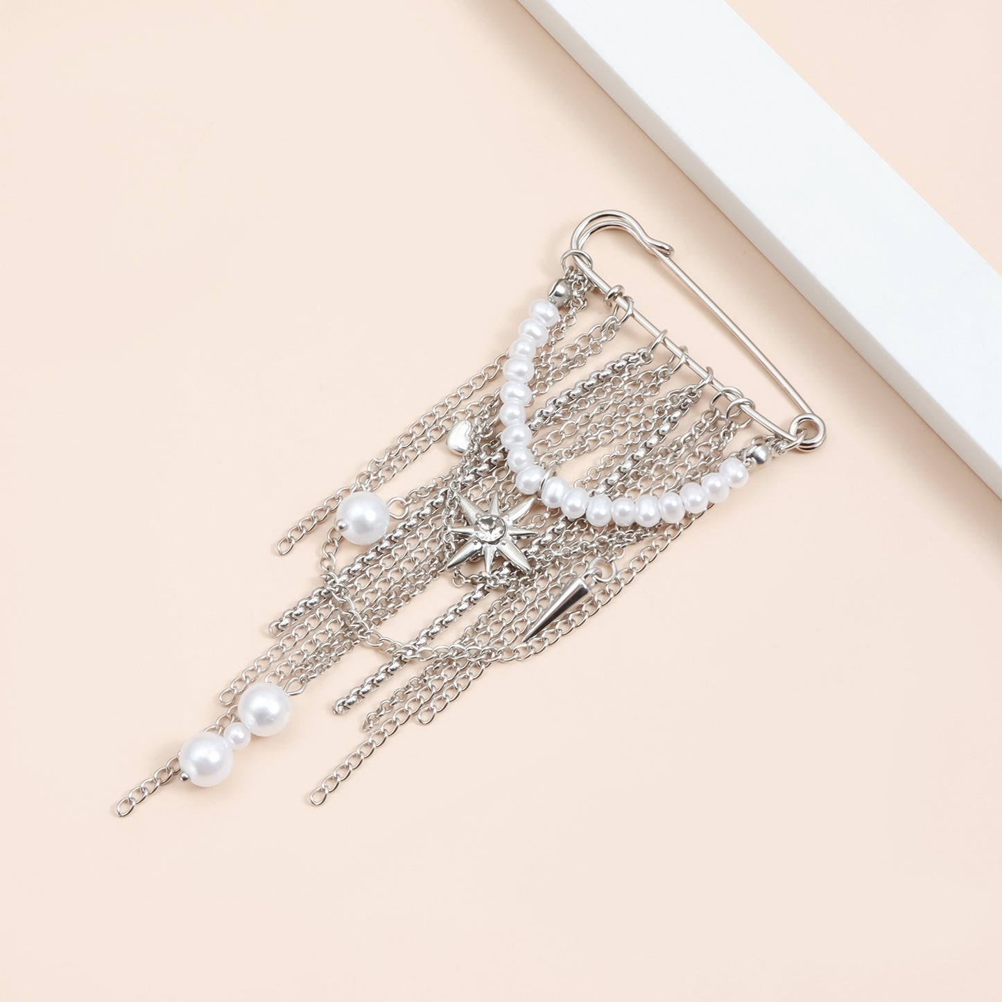 Elegant Geometric Star Alloy Brooch with Pearl Inlay and Tassel Details