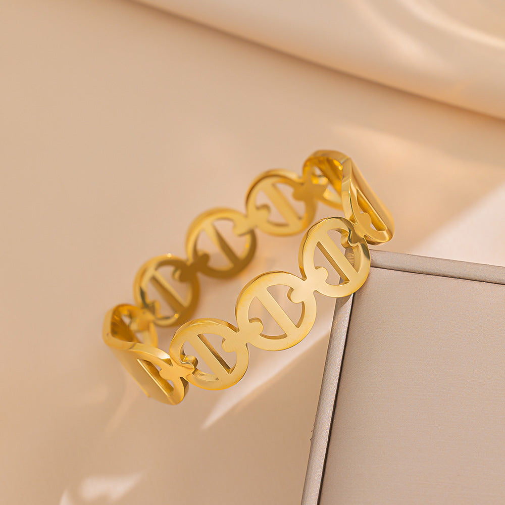 Bracciale da donna minimalista in acciaio inossidabile traforato con design a catena intrecciata e finitura galvanica