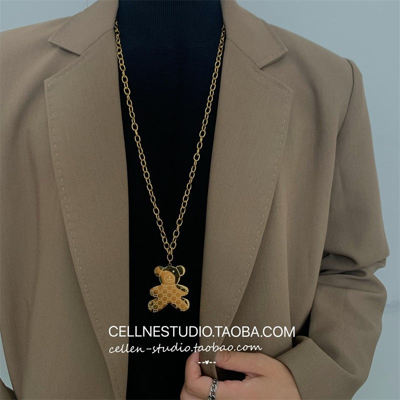 Collana con ciondolo a orso minimalista in acciaio al titanio con finitura placcata, catena a onda d'acqua, design geometrico, accessorio di moda unisex