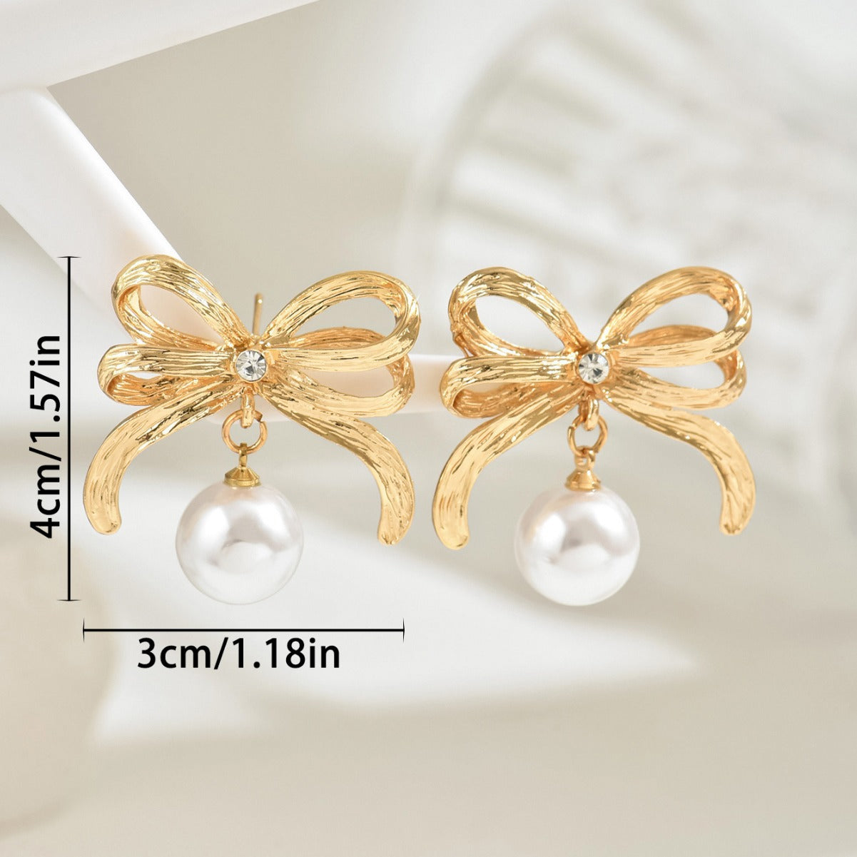 Minimalist Bow-Shaped Alloy Earrings with Pearl Inlay for Women Stainless Steel Post Elegant Everyday Wear