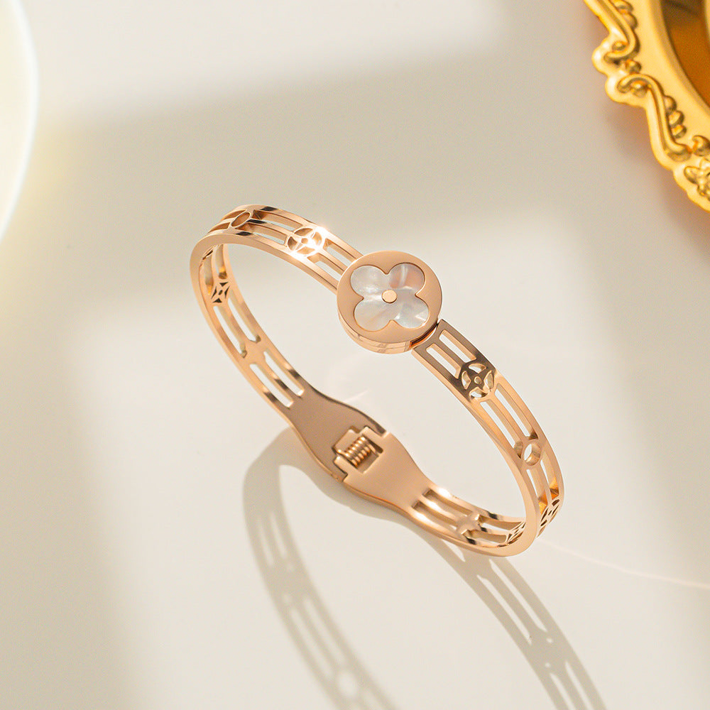 Luxury Style Four-Leaf Clover Shaped Titanium Steel Bracelet with Hollow-Out Design and White Shell Inlay for Women