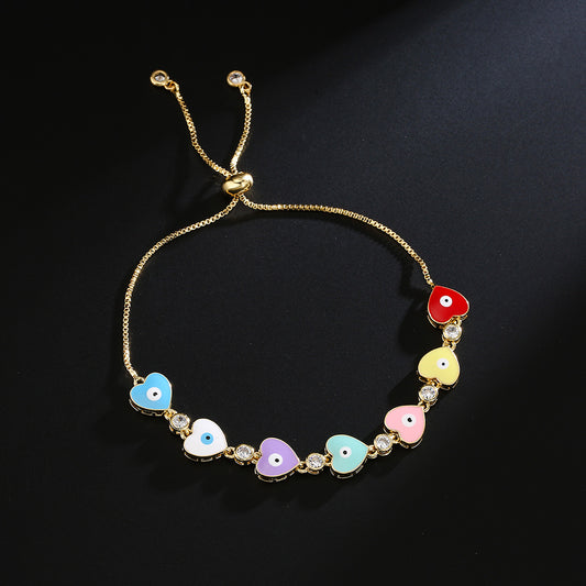 Bracciale in Rame Geometrico Stile INS Carino con Placcatura in Oro 18K, Zirconi Micro-Incastonati, Ciondolo Occhio a Cuore in Smalto per Donna