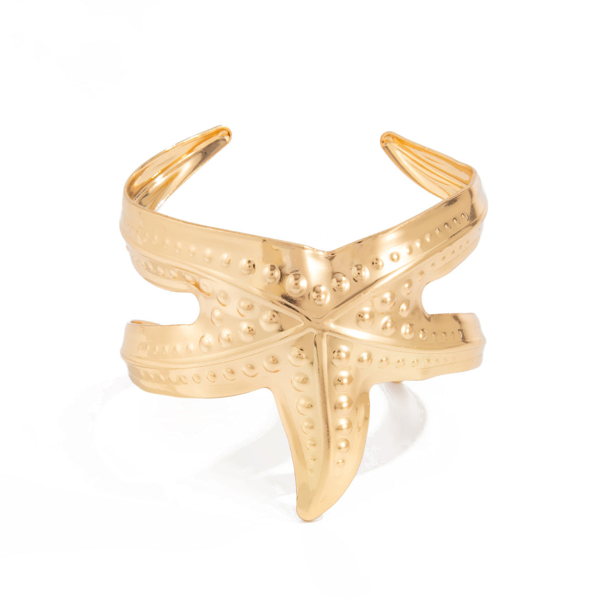 Pulsera metálica con forma de estrella de mar exagerada y acabado galvanizado para un estilo playero y oceánico
