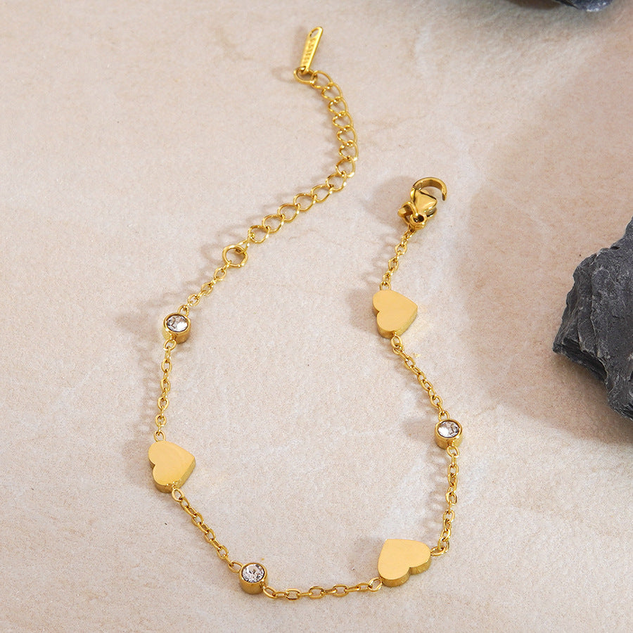 Elegante set collana e bracciale in oro 18 carati placcato con zirconi cubici a forma di cuore, catena in acciaio inossidabile e titanio per donne
