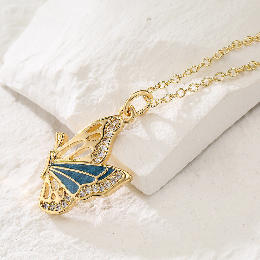 Minimalist Butterfly Pendant Necklace for Women with Copper Base Plated in 18K Gold and Enamel Finish Featuring Cubic Zirconia Accents