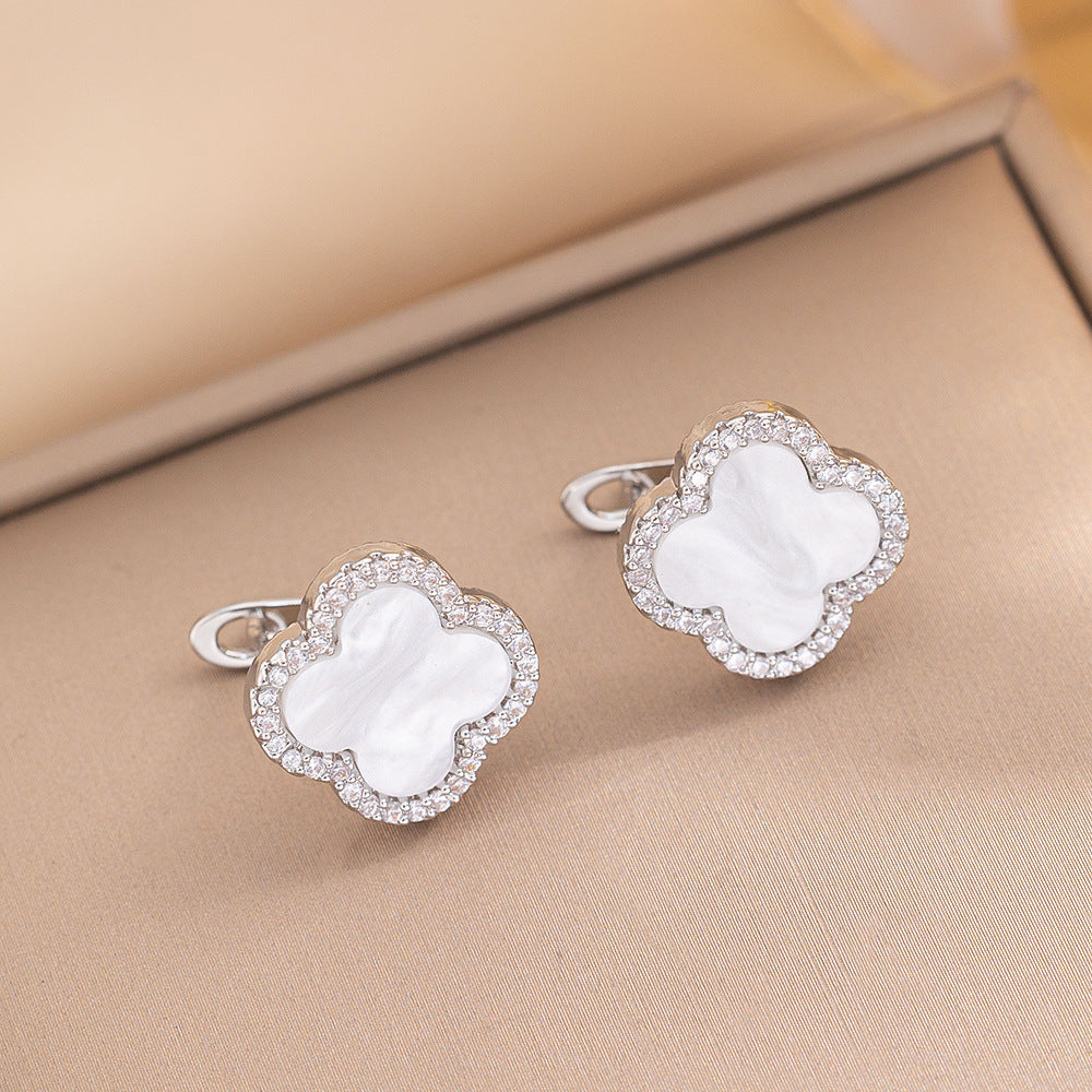 Orecchini a perno Saturno minimalisti color oro in ottone con zirconi per donna