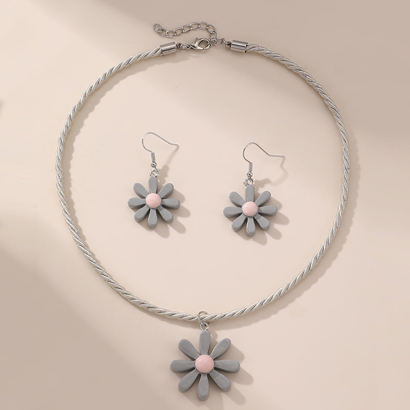 Set collana a forma di fiocco minimalista in acrilico per bambine con ciondolo in resina e catena di perline per bambini dai 3 ai 10 anni