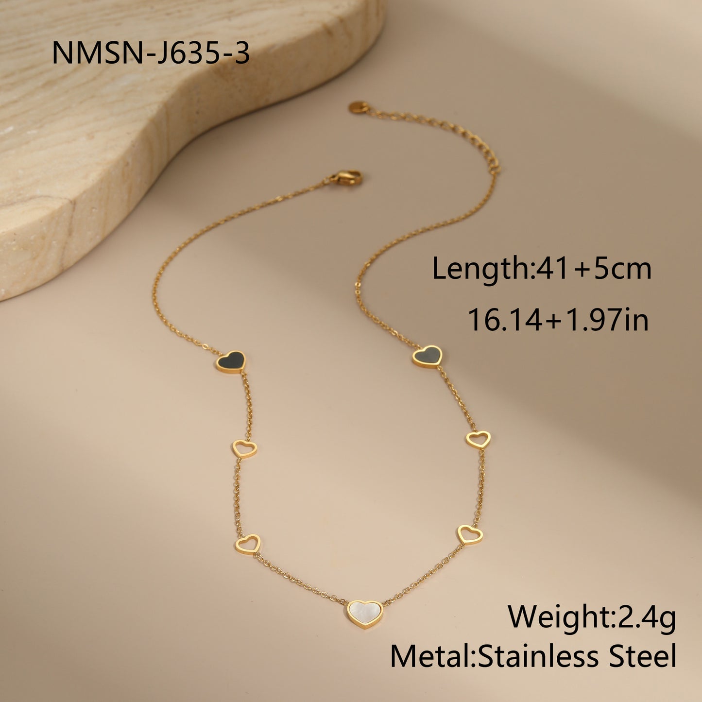 Collar con colgante de corazón hueco a la moda de acero inoxidable con incrustaciones de circonia para mujer