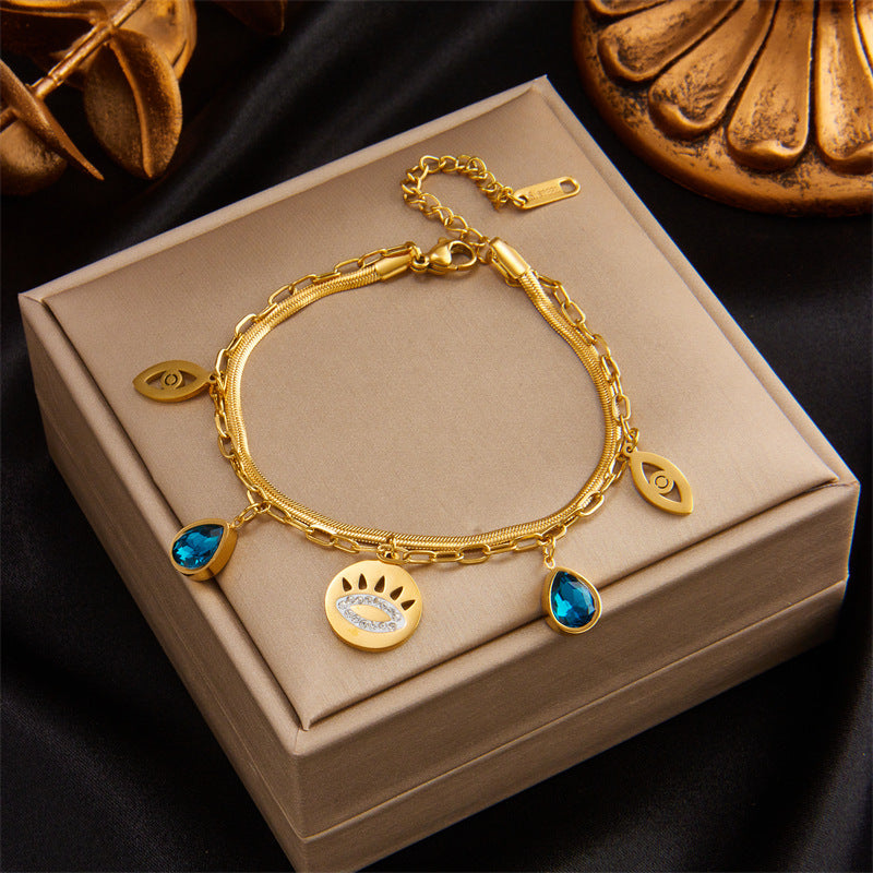 Minimalist Retro Blue Rhinestone Teardrop Hollow Eye Bracelet in Titanium Steel with Double Layer Chain