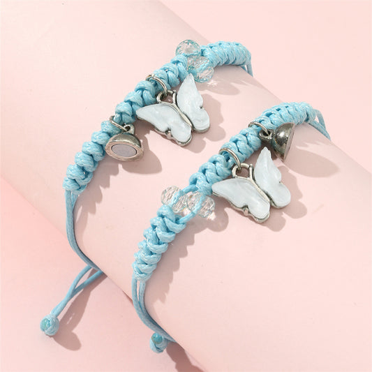 Braccialetto regolabile intrecciato a mano colorato con ciondolo a farfalla bianca minimalista per bambini