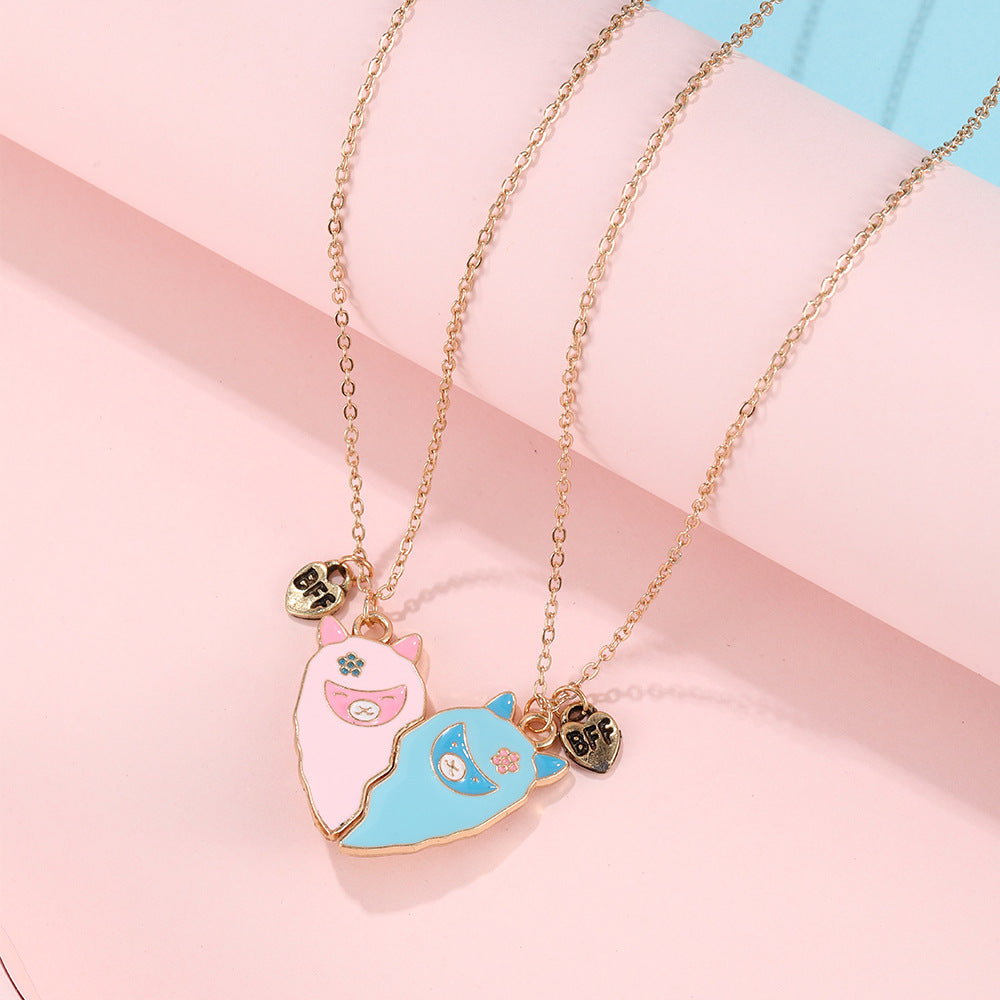 Collar con colgante de dinosaurio de dibujos animados para niños y adultos con cierre magnético, diseño de animal en forma de corazón de aleación, acabado esmaltado, estilo de cadena cruzada