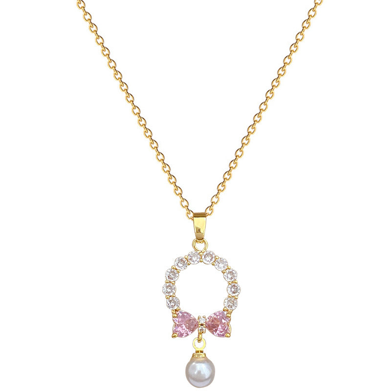 Elegante conjunto de collar y pendientes de mariposa de acero titanio con detalles de perlas e incrustaciones completas de diamantes de imitación para eventos formales de mujer