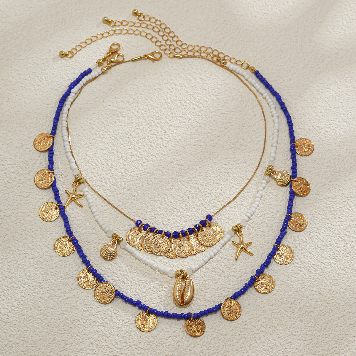 Collana con ciondolo a moneta in stile bohémien vintage in lega placcata su catena di perline da donna