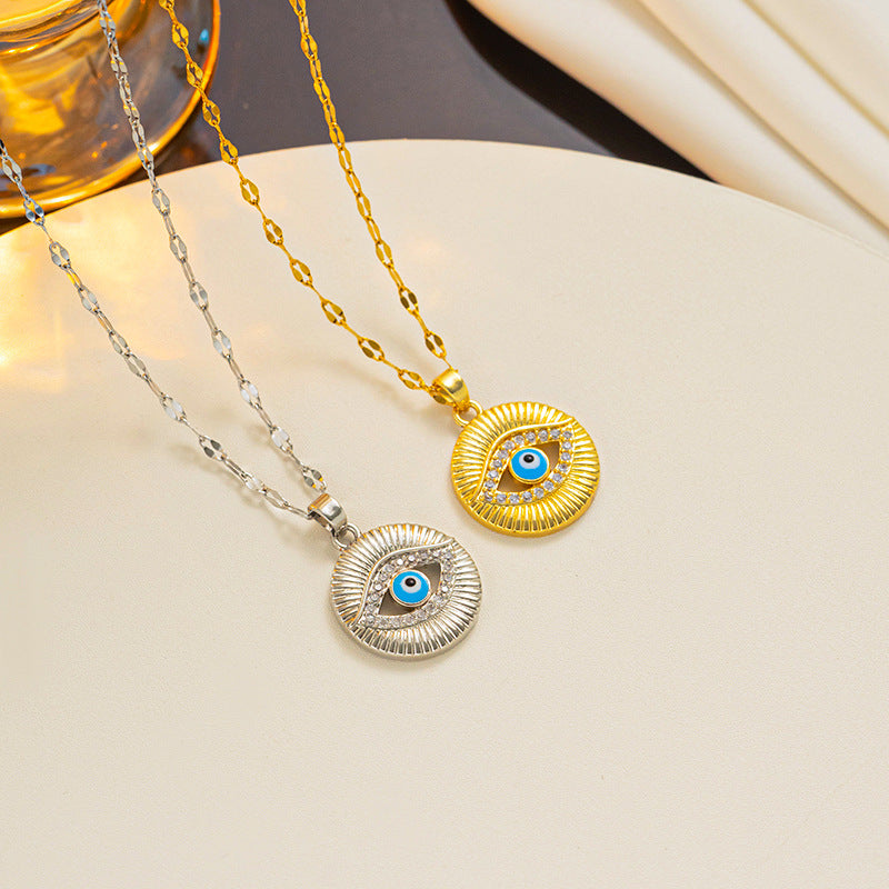 Collana con ciondolo occhio di Allah alla moda in acciaio al titanio con finitura galvanizzata, design a occhio in smalto blu su catena ondulata, unisex