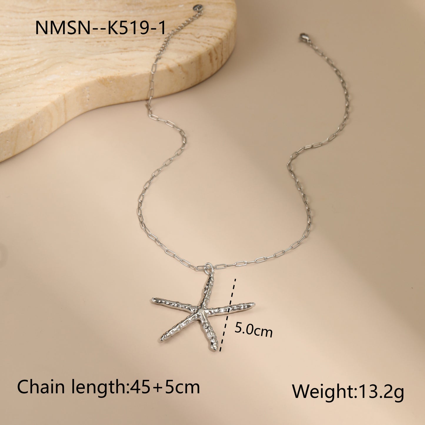 Elegante collar con colgante de estrella de mar de inspiración marina en acero inoxidable con textura martillada y acabado galvanizado para mujer