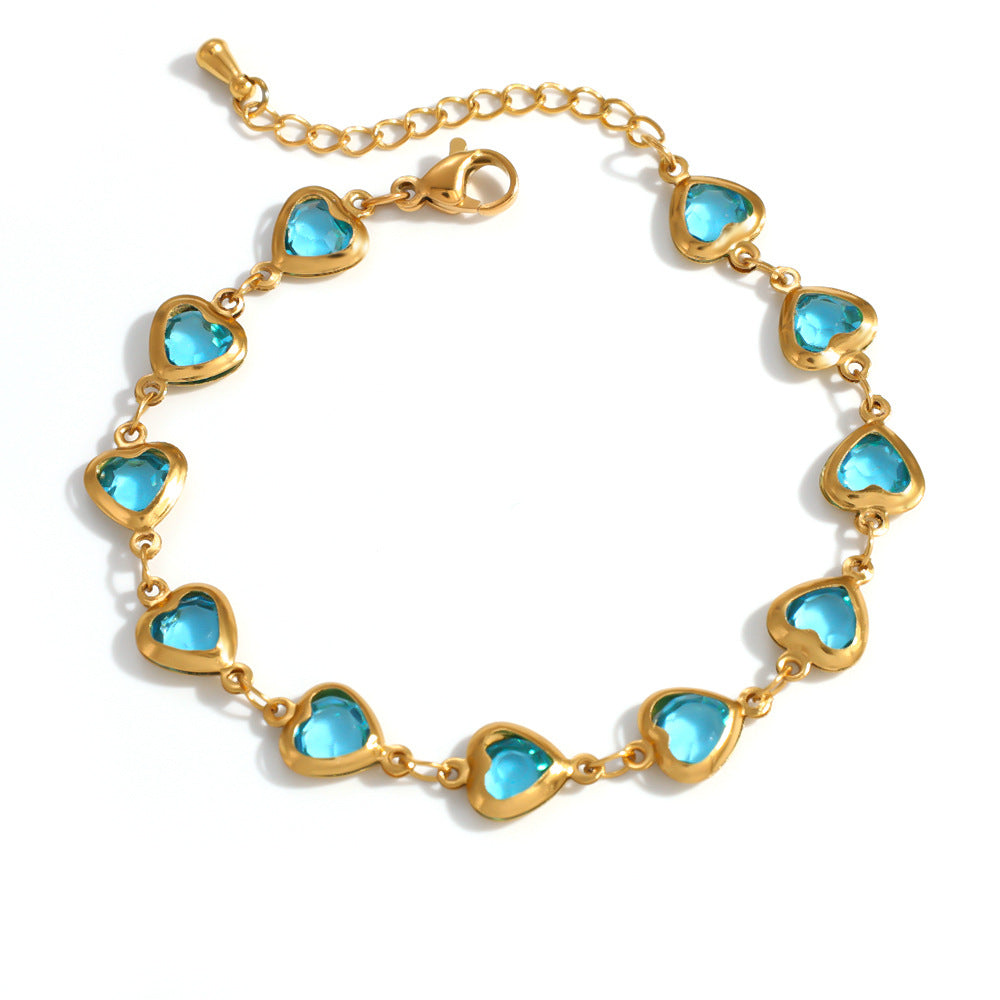 Elegante bracciale da donna in acciaio inossidabile placcato oro 18 carati a forma di cuore con intarsio di cristalli colorati