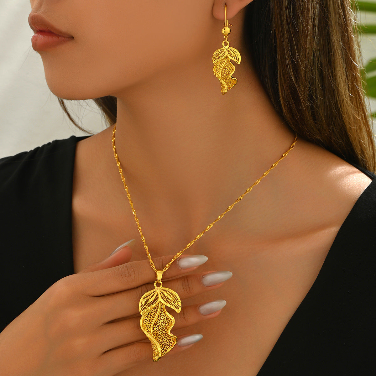Parure di collana e orecchini da donna placcati in lega di zinco a forma di foglia, in stile minimalista