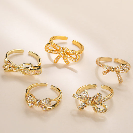 Anillo abierto con nudo geométrico para mujer en cobre con chapado en oro de 18 quilates e incrustaciones de circonita cúbica