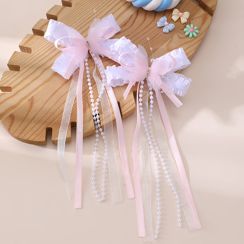 Pinza de pelo en forma de lazo de estilo natural para niños con detalles de volantes y malla hecha de resina plástica