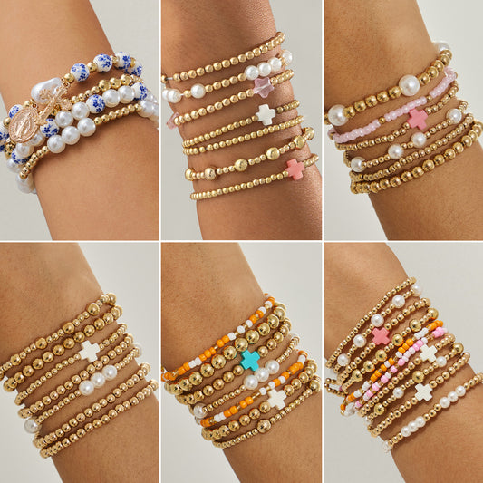 Bracciale da donna elastico in perline Bohemien con stella e croce, impreziosito da perle sintetiche e design irregolare