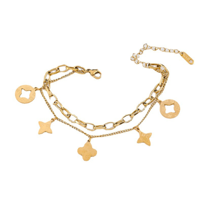 Elegante Pulsera Minimalista de Acero de Titanio con Colgante Redondo Bañado en Oro de 18K y Dije de Hoja para Mujer