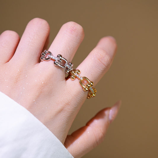Anello Lusso Regolabile Aperto da Donna con Intarsio in Zirconi su Fascia in Ottone Placcato Oro a Goccia Cuore e Forme Geometriche