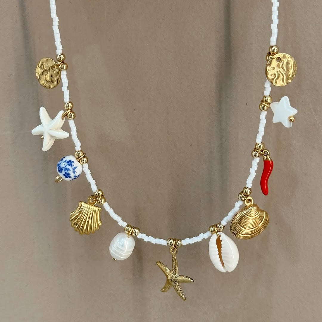 Bohemian Beach Shell Necklace with Starfish and Conch Pendant in Stainless Steel with Plated Finish