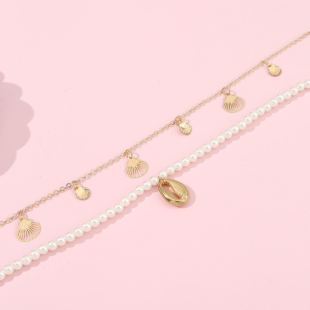 Set di collana con ciondolo a forma di conchiglia minimalista in lega per ragazze con catena di perle e finitura artigianale