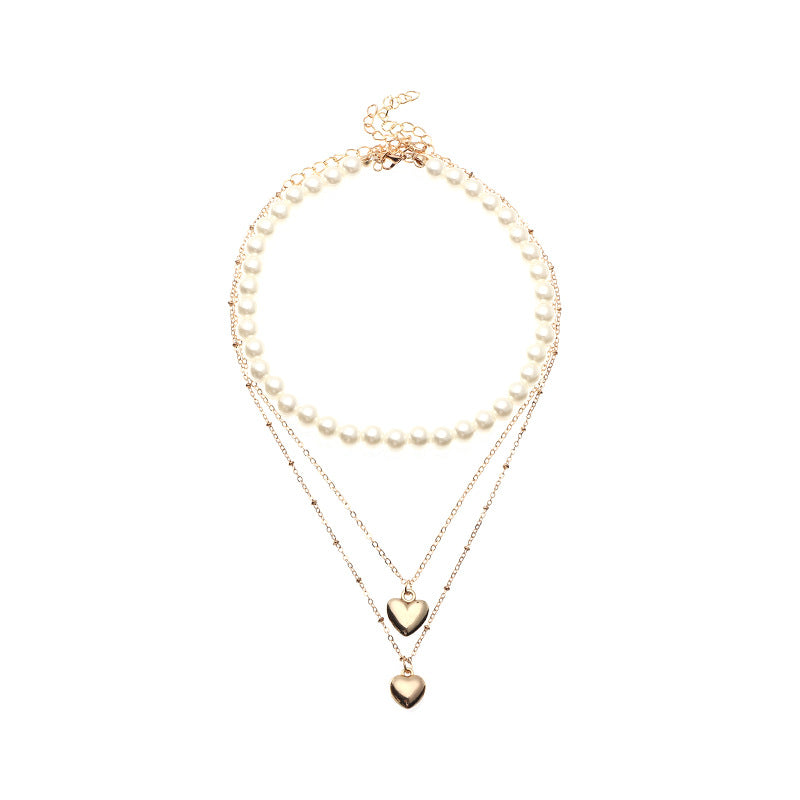 Collar infantil multicapa de inspiración vintage con moneda de perlas y colgante de corazón en cadena de caja para niñas