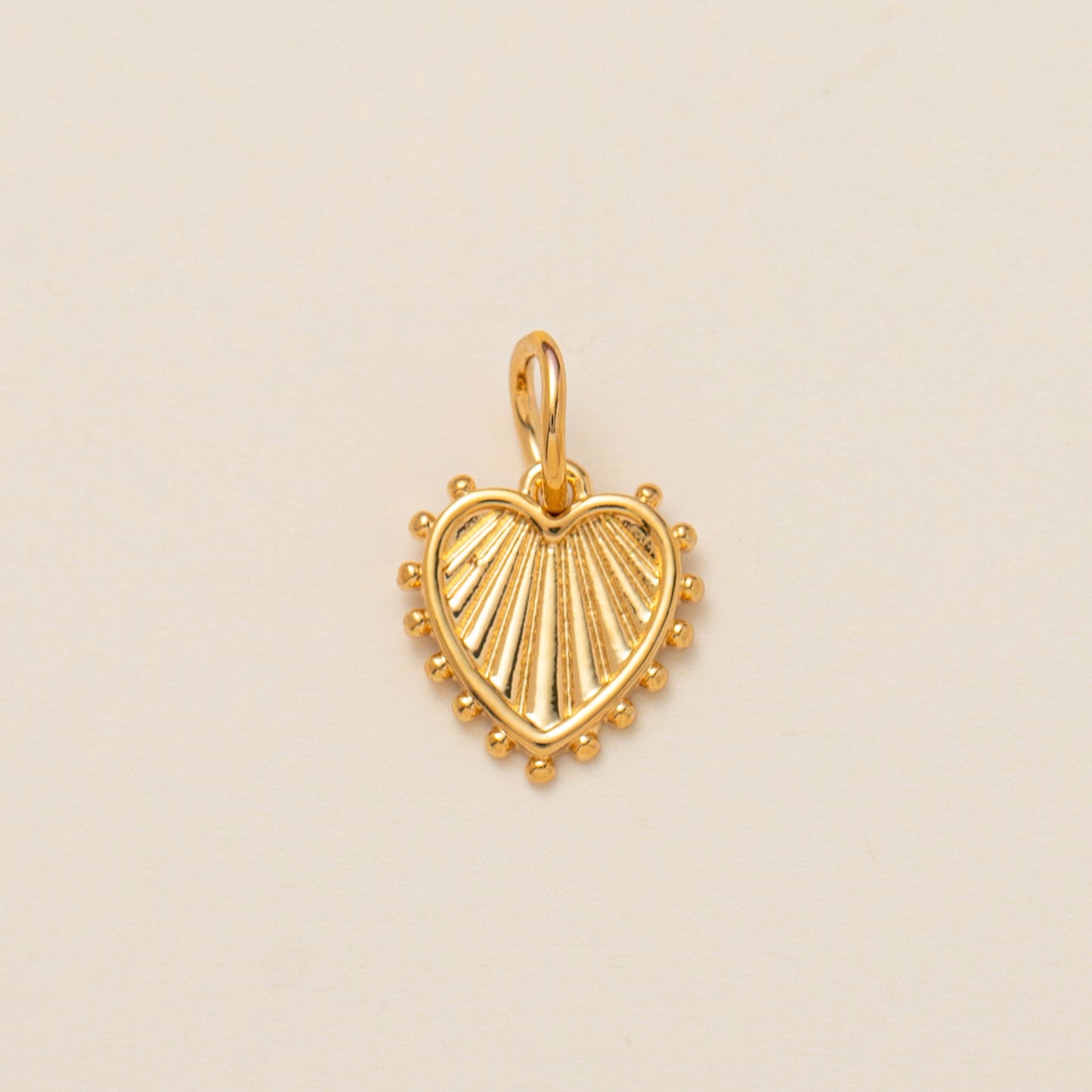 Collana con ciondolo a forma di cuore geometrico in ottone e zirconi cubici