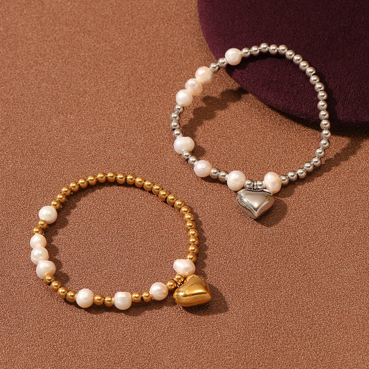 Pulsera de titanio de corazón con perlas minimalistas de moda para mujer con acabado chapado y diseño de cuentas