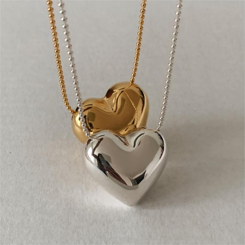 Collar minimalista con colgante de corazón en plata de ley 925 con cadena trenzada
