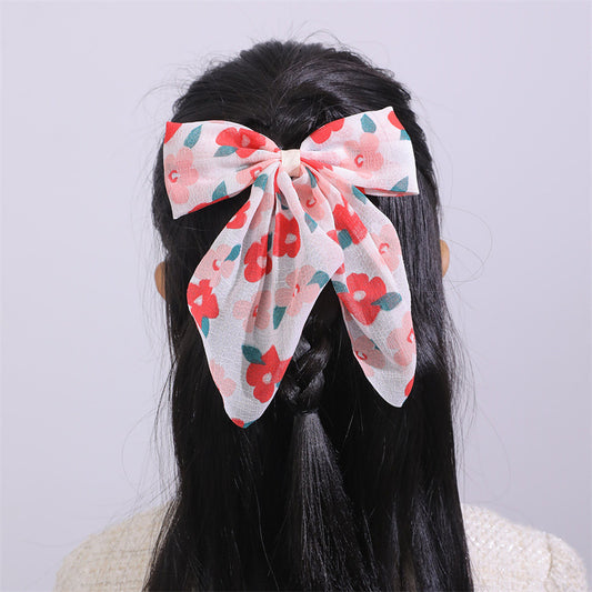 Sweet Style Fabric Bow Hair Clip Set for Kids with Floral Print and Short Ribbon Accents