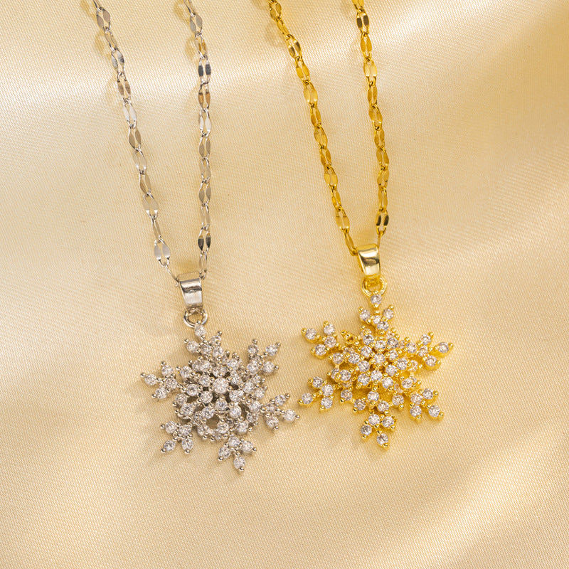 Collana di lusso con pendente a fiocco di neve rotante per donna in acciaio al titanio con strass micro-pavé e catena a onda d'acqua, collana per clavicola