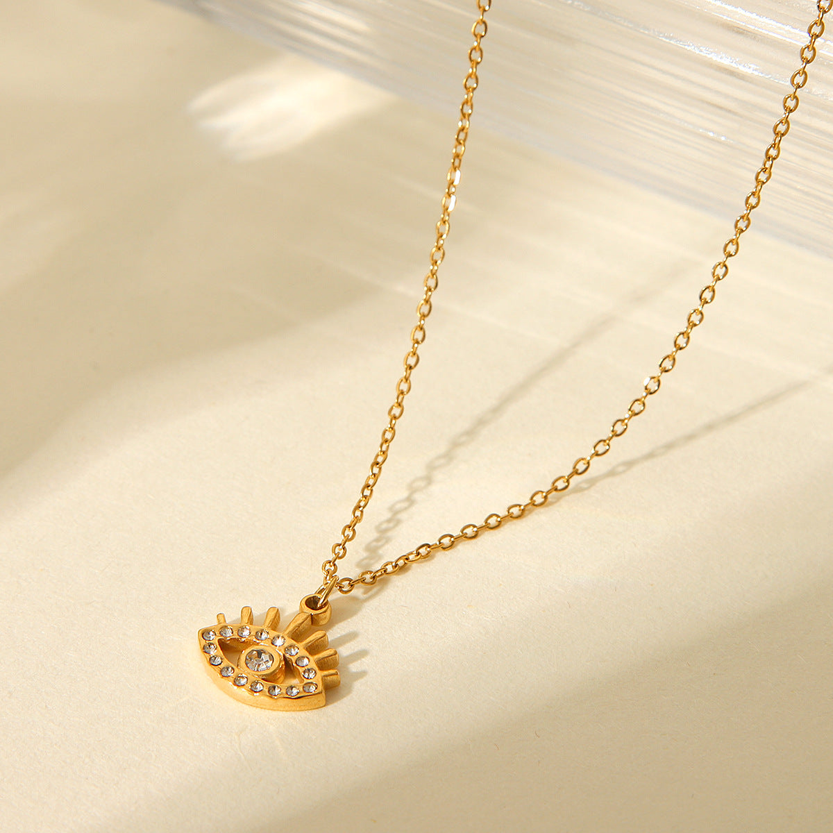 Collana con Pendente Occhio Turco in Acciaio Inossidabile Placcato Oro 18K Stile Geometrico Ins con Intarsio di Strass da Donna