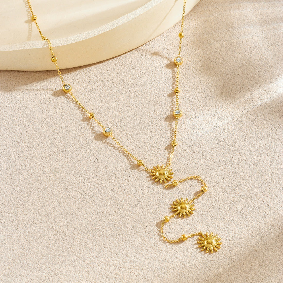Elegant Stainless Steel Sunflower Pendant Necklace with Rhinestone Inlay and Tassel Detail for Women