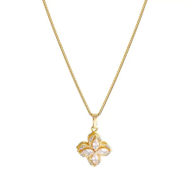Minimalist Rotating Flower Pendant Necklace in Titanium Steel with Gold Plating and Cubic Zirconia Accents for Women