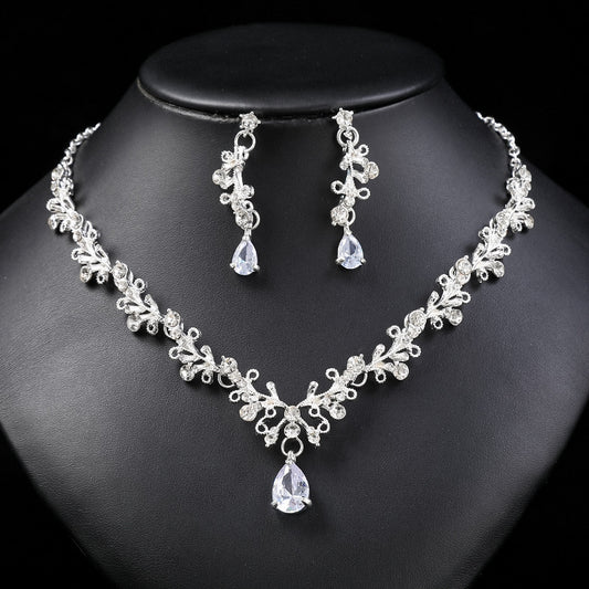 Juego de collar y pendientes de aleación dulce y fresca con colgante de cristal en forma de campana de gota de corazón, acabado chapado para mujeres