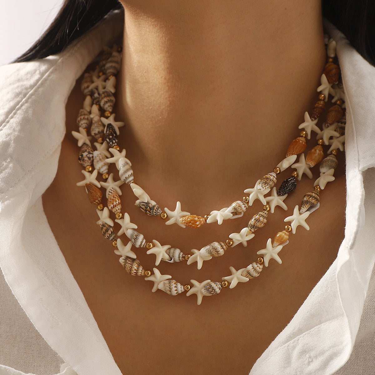 Set di collana con conchiglia a stella bohémien e ciondolo a stella da donna con catena in lega e dettagli in resina