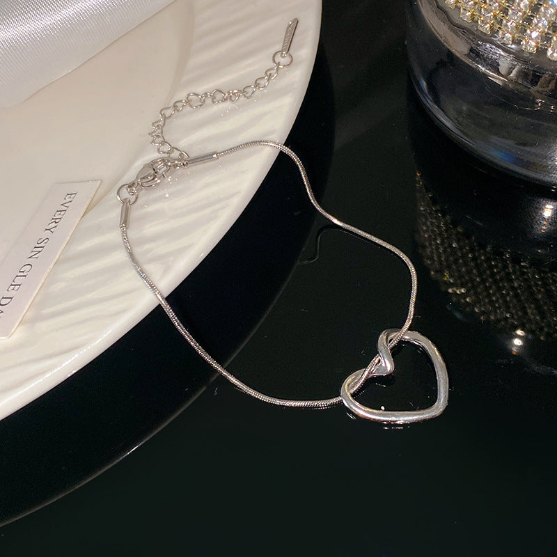Hollow Heart Geometric Plated Titanium Steel Bracelet Unisex