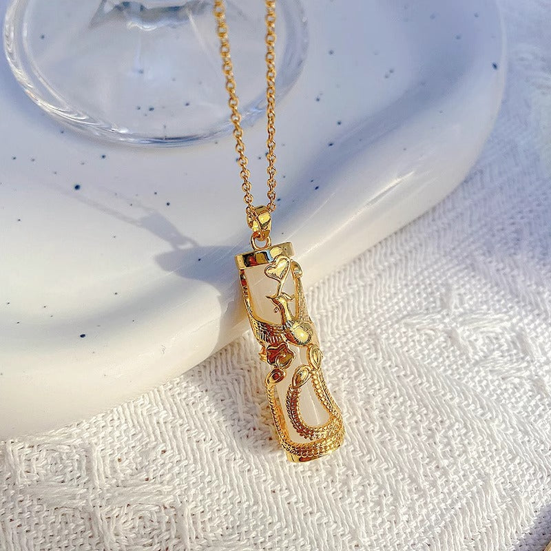 Collana Pendente Fenice Floreale Irregolare dal Design Originale in Acciaio Titanio Placcato Oro per Donna Unisex Minimalista Ciondolo a Medaglione Regalo